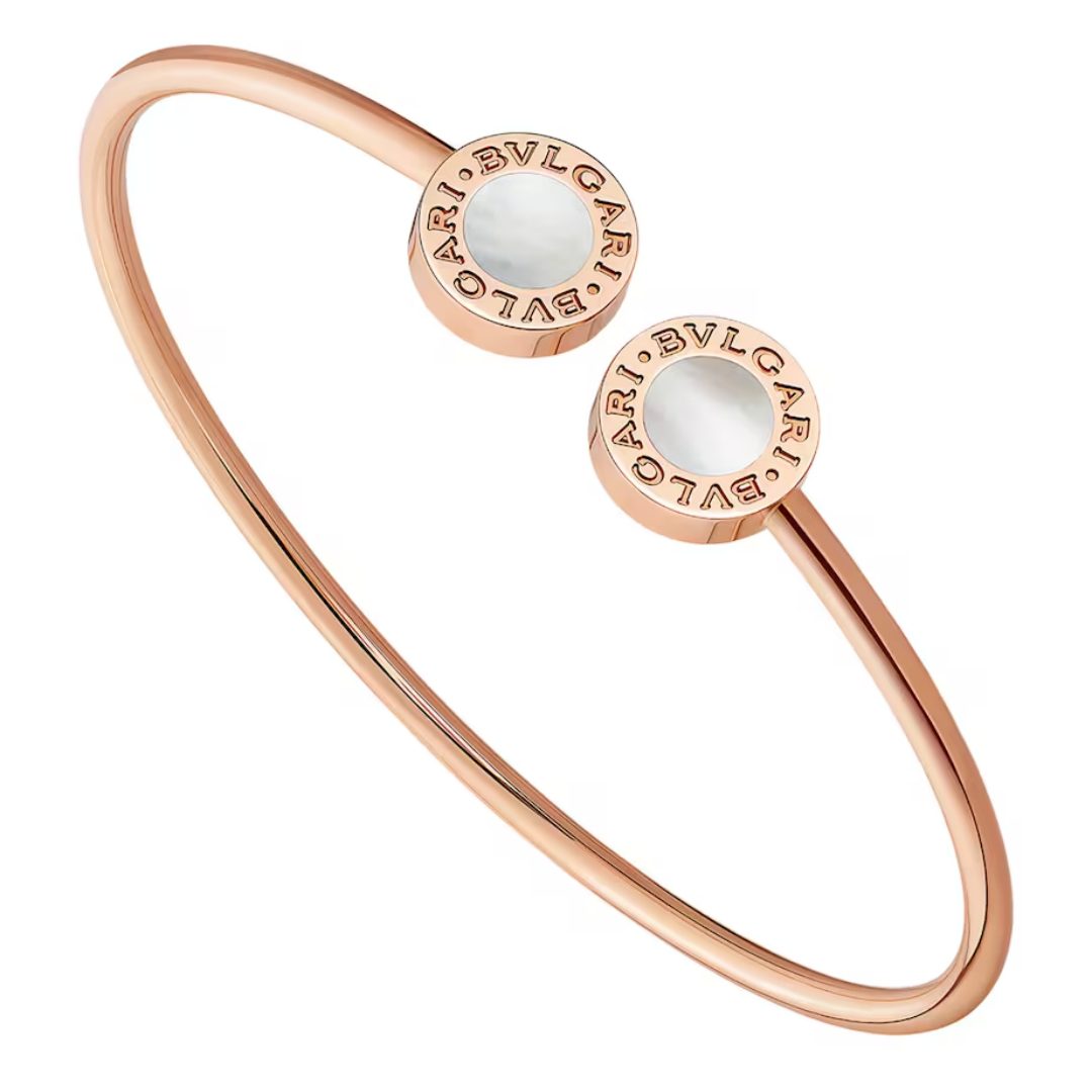 Bvlgari Bvlgari Rose Gold and Mother-of-Pearl Bracelet Bvlgari Bvlgari Mother-of-Pearl Bracelet fake in solid 18K rose gold with double logo disc design and white inlay.